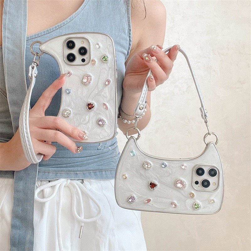 Creative Phone Case with Top Handle – Synthetic gemstones add luxury shine. Easy carry handle, precise cutouts. Durable TPU protection. Transform your phone into a chic accessory.